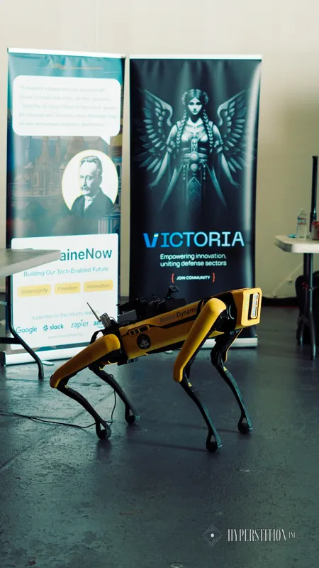 A quadruped robot on display in the hardware showcase.