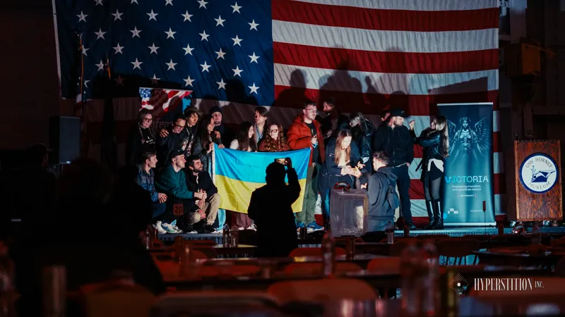 Participants gather on stage at the end of the weekend.